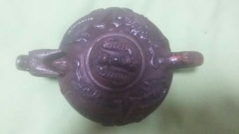 紫砂壺工藝品的價格解析 以37厘米×36厘米為例