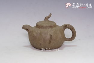 時光鐫刻的匠心 鮑國新紫砂壺作品《年輪》的藝術解讀